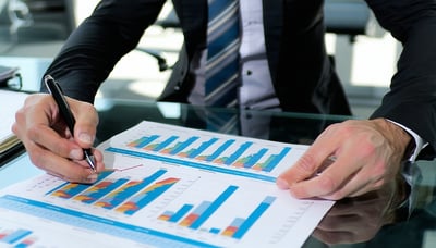 Business owner reviewing funding options with Action Capital Group Business owner reviewing funding options with Action Capital Group